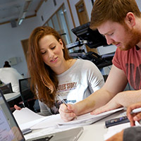 2 students working at desk