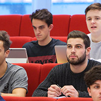 Students sitting in lecture theatre