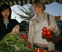 Student at a fruit and vegetable stall